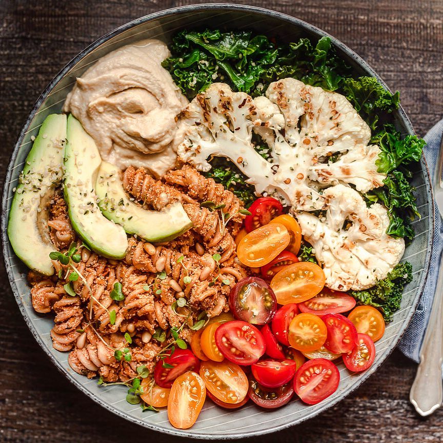 Tomato pesto pasta, roasted cauliflower steaks, homemade hummus ...